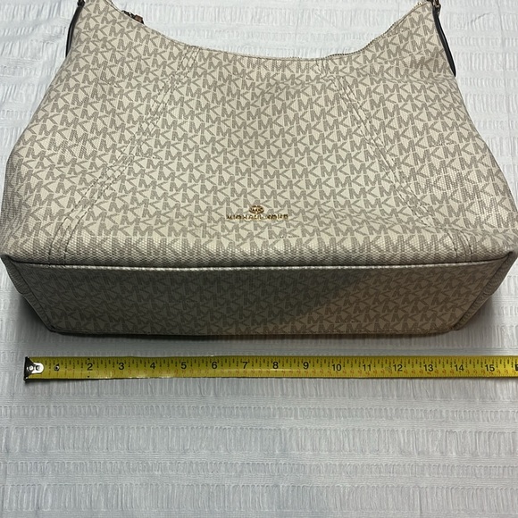 Michaell Kors signature shoulder bag- cream background with gray-ish MK’s. - Picture 13 of 16